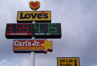 image of truck stop restaurant and gas station sign