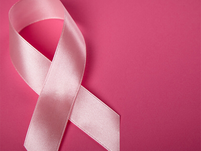 image of Breast Cancer Ribbon on pink background