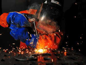 Closeup image of a welder welding